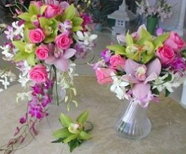 Photo of two flower arrangements